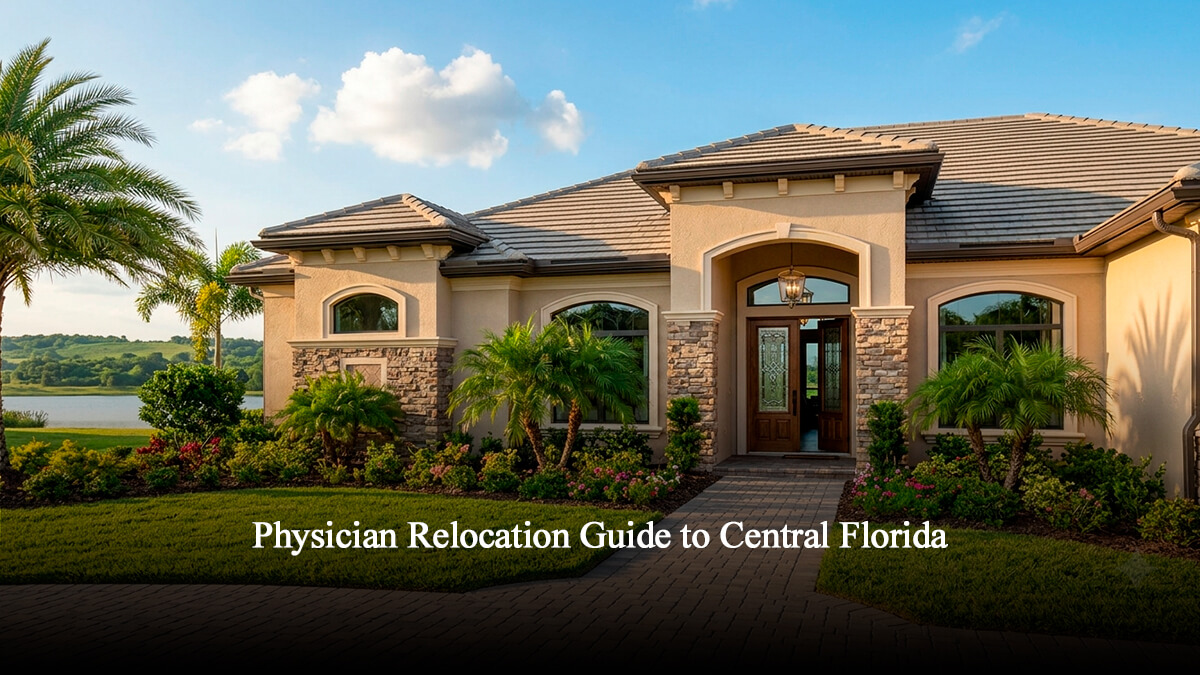 Luxury estate home in Windermere Central Florida with a paved driveway and tropical landscaping near a lake.